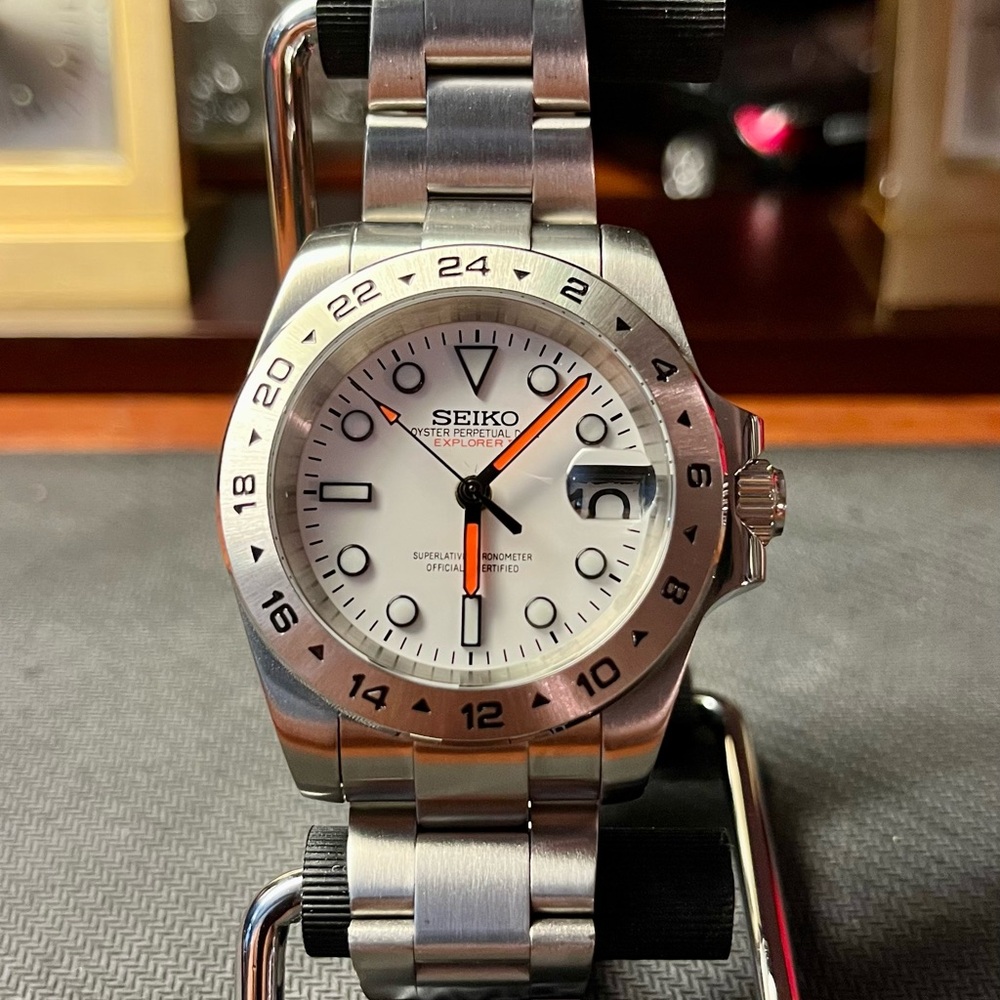 Seiko Mod: Silver Watch with White and Black Accents. Black w/orange lume hands.